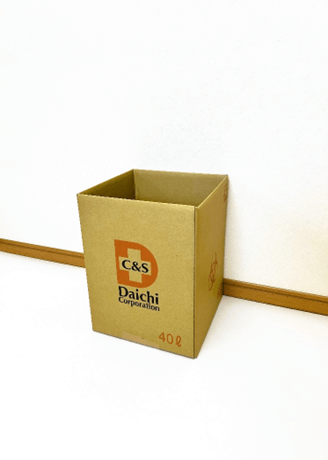 茶色い箱にオレンジ色のハザードマークがついた40L入る段ボール